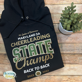 Black hooded sweatshirt featuring a 3-color glitter logo for the 1st Ladies of Damascus Maryland 2A Cheerleading State Champs. The design includes the text "Back to Back" with the dates 2022 and 2023.