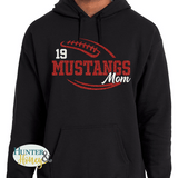 A black hoodie with a  red and white glitter football graphic with Mustangs Mom cutting through the middle of the football and customized with a player's jersey number above Mustangs.