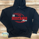 A black hoodie with a large red and white football graphic with Mustangs Mon cutting through the middle of the football. A player's jersey number is customized and placed above Mustangs.