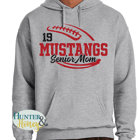 Gray hoodie with a red and black glitter large football graphic with Mustangs Senior Mom in the middle of the football. 