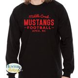 A black ringspun cotton long sleeve tee with a red imprint that reads Middle Creek Mustangs Football Apex, NC.