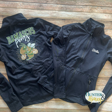 Black Damascus Poms Zip-Up athletic jacket featuring a 3-color glitter design on the back that reads Damascus Pom with the hornet holding poms and surrounded by  #10 A/B rhinestones. The front of the jacket features the athlete's name on the left chest in white glitter.