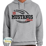 A gray hoodie with a black and red glitter football graphic with Mustangs Mom cutting through the middle of the football and customized with a player's jersey number above Mustangs.