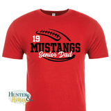 A red short-sleeve crewneck t-shirt with a two-color black and white football and the text Mustangs Senior Dad running in the middle of the football.