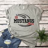 A gray short-sleeve crewneck t-shirt with a black and red glitter graphic of a football that has Mustangs Mom cutting through the middle of the football. The player's number is above the word Mustangs. 