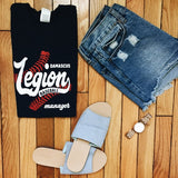 Flat lay of American Legion navy blue baseball tee with red laces.