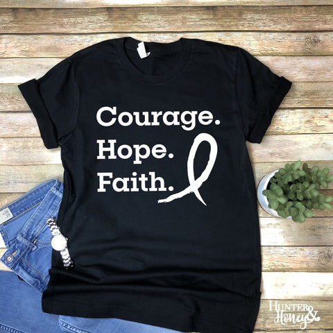 Courage Hope Faith cancer awareness tee in black with white text on a 100% ringspun cotton unisex fit tee.