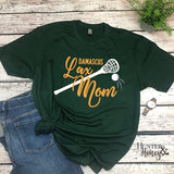 Damascus Lax Mom with stick graphic on a green t-shirt
