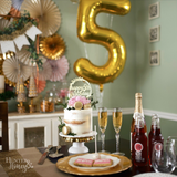 Happy 5th birthday vine gold glitter cake topper.