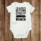 I'm Always Getting Picked Up by Women white short sleeve infant bodysuit with pickup truck.